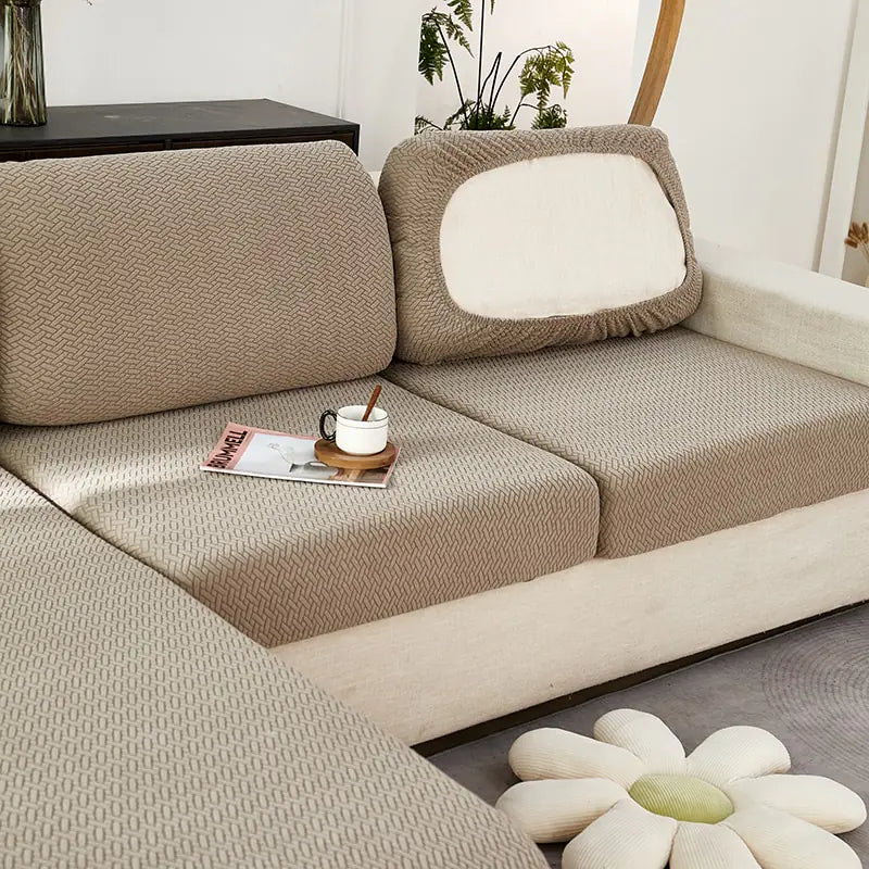 Green universal sofa cover by Lamp Post with back cushions, designed to protect and refresh your sofa.