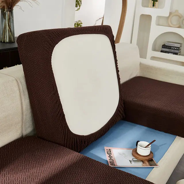 Green universal sofa cover with back cushions by Lamp Post, designed to protect and refresh your sofa's appearance.