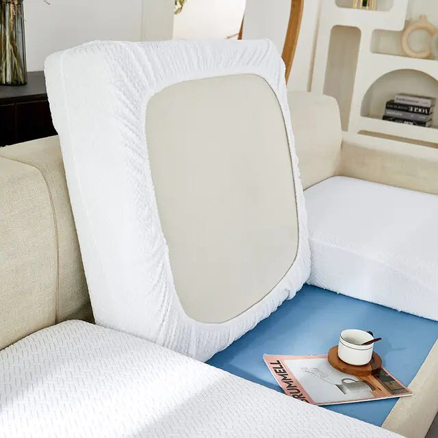 Green universal sofa cover by Lamp Post with back cushions, designed to protect and update your sofa's look.