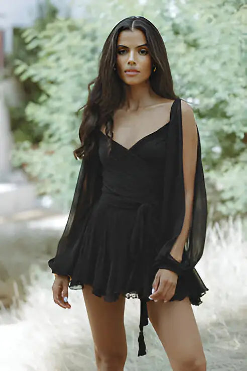 Green summer women’s dress by Lamp Post featuring a lightweight, flowy fabric and a casual, stylish design for warm weather.