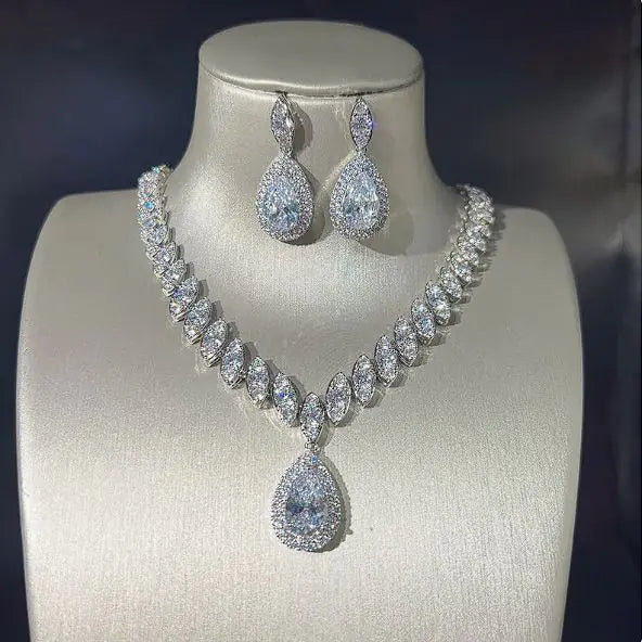 Green women necklace and earring set by Lamp Post featuring matching jewelry with elegant design.