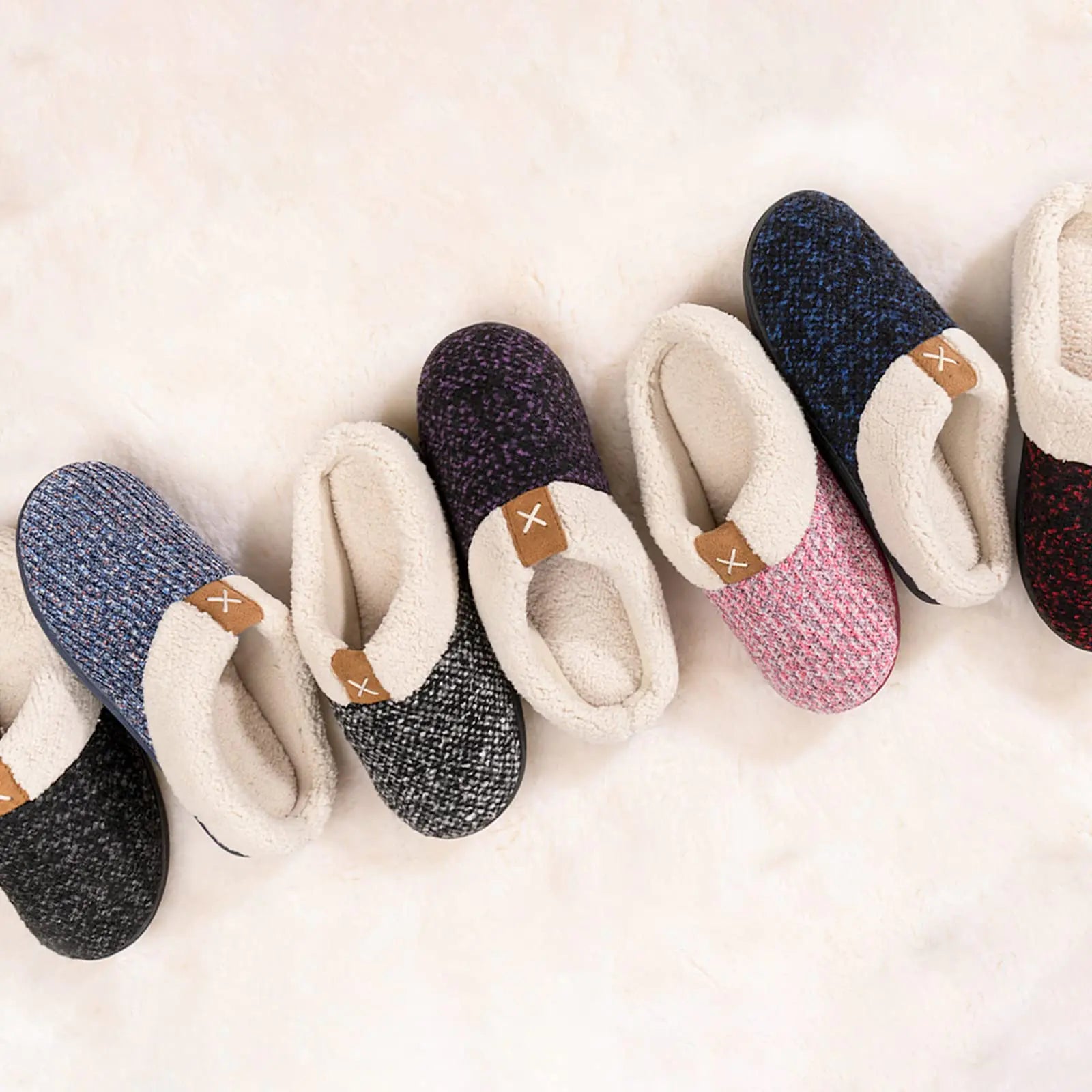 Grey women's slipper from Lamp Post with plush memory foam interior and slip-on design for comfort at home.