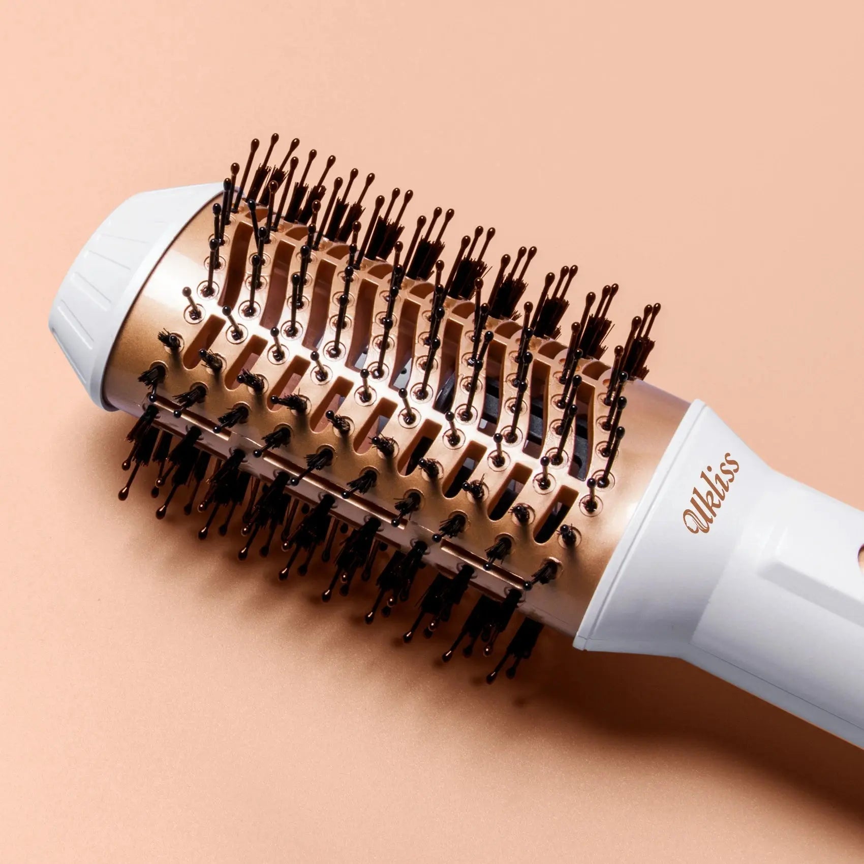 Lamp Post one-step hot air brush hair dryer for women, combines drying and straightening in a sleek electric hair blower brush.