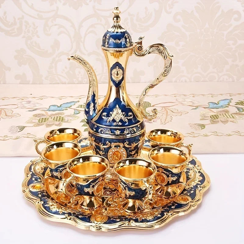 Vintage metal Turkish coffee pot and European-style tea set with six luxury cups, craft tea tray, and teapot for serving tea.