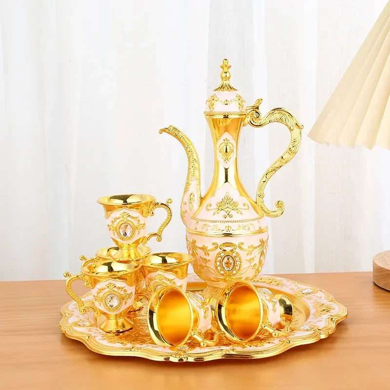 Vintage metal Turkish coffee pot and European-style tea set with six luxury cups, craft tea tray, and teapot for serving tea.