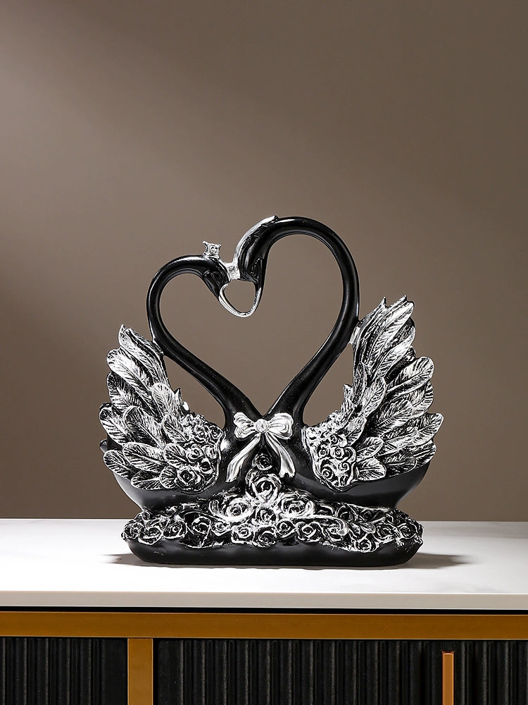 Lamp Post black swan wine rack decoration on a dining table holding red wine bottles, adding elegant home decor charm