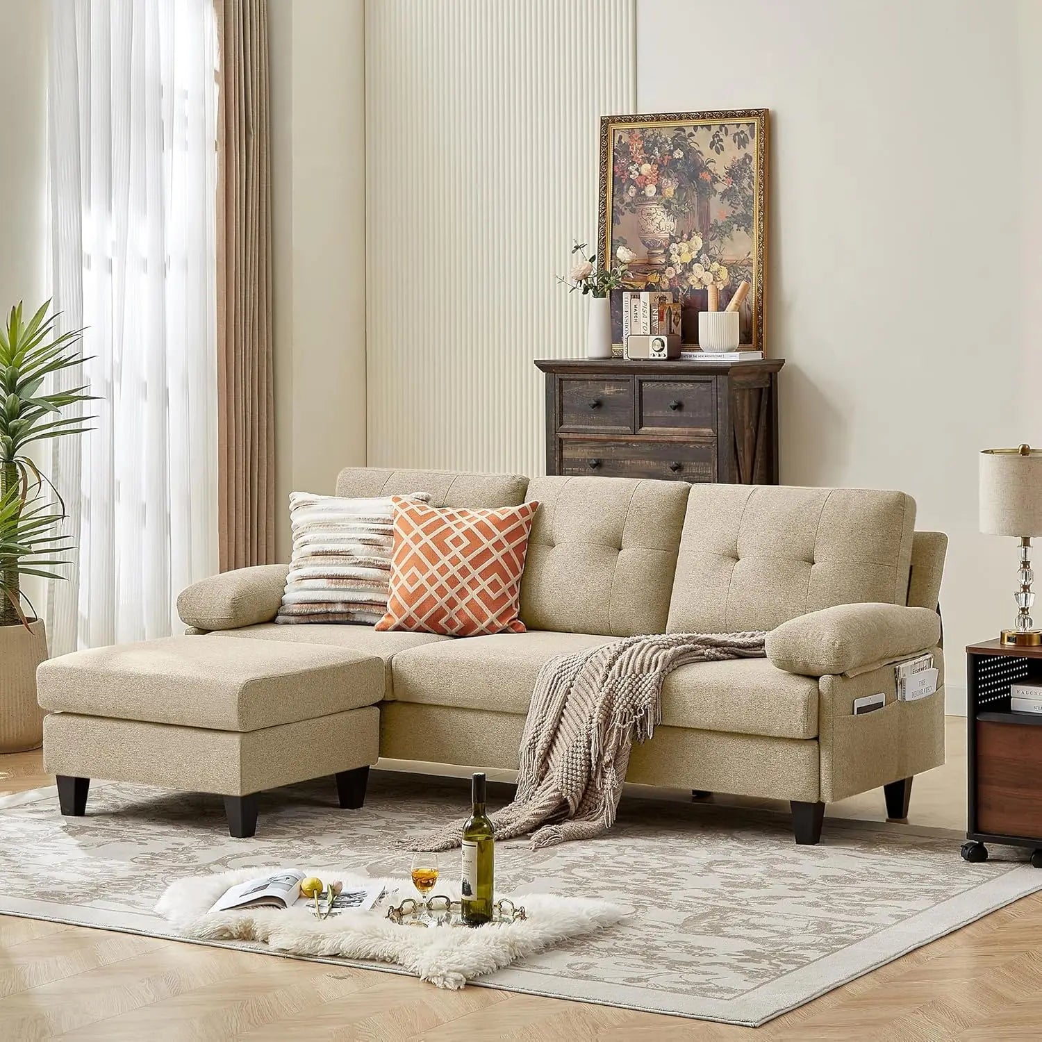 Beige L-shaped convertible sectional sofa with deep cushions and reversible chaise, modular design for living room comfort.