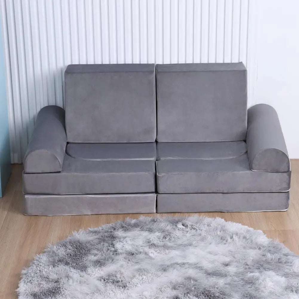 Dark gray Kid Couch from Lamp Post, a detachable modular children's sofa with playful design for kids' room comfort.