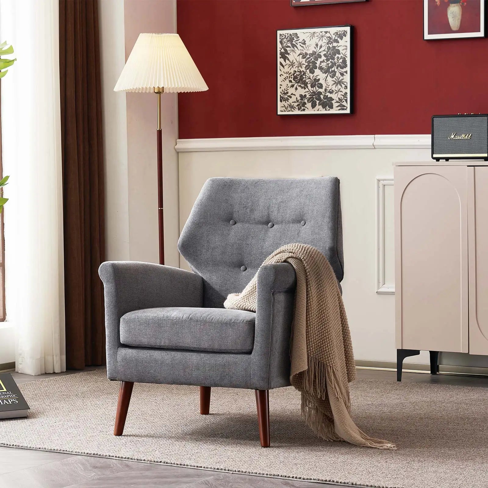 Light grey reading chair with wooden legs from Lamp Post, ideal for living room decor and home comfort.