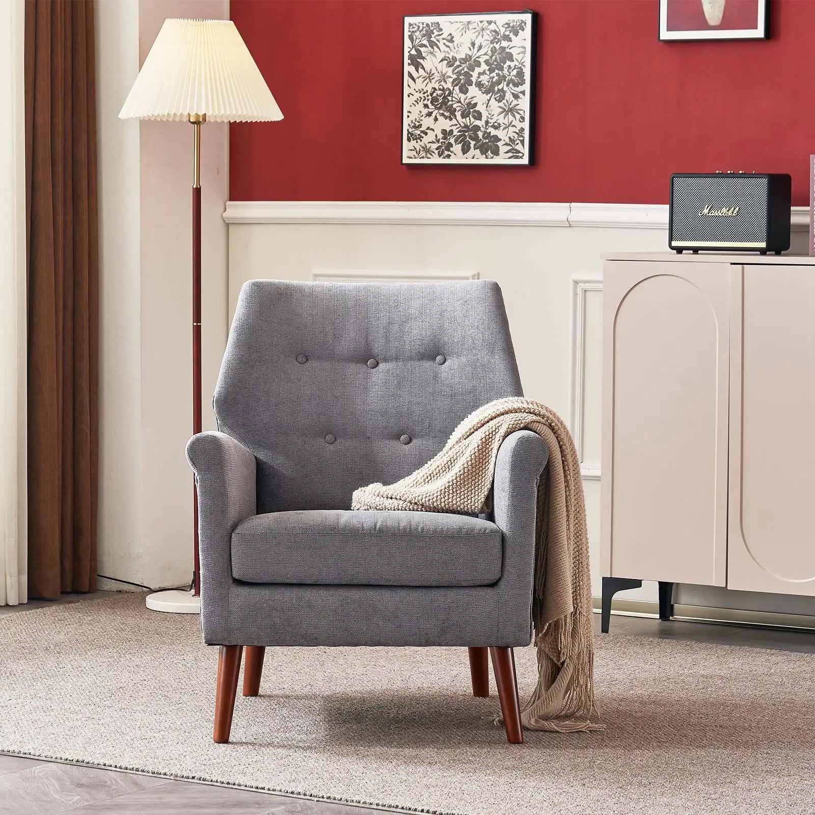Light grey reading chair with wooden legs from Lamp Post, part of a home sofa set for living rooms.