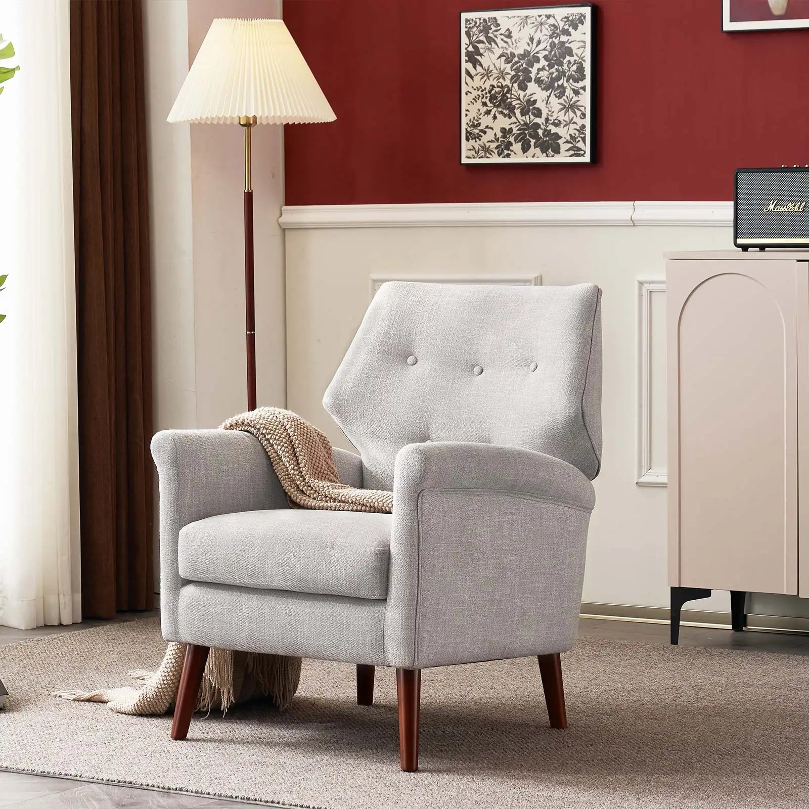 Light grey reading chair with wooden legs from Lamp Post, ideal for living room relaxation and stylish home seating.