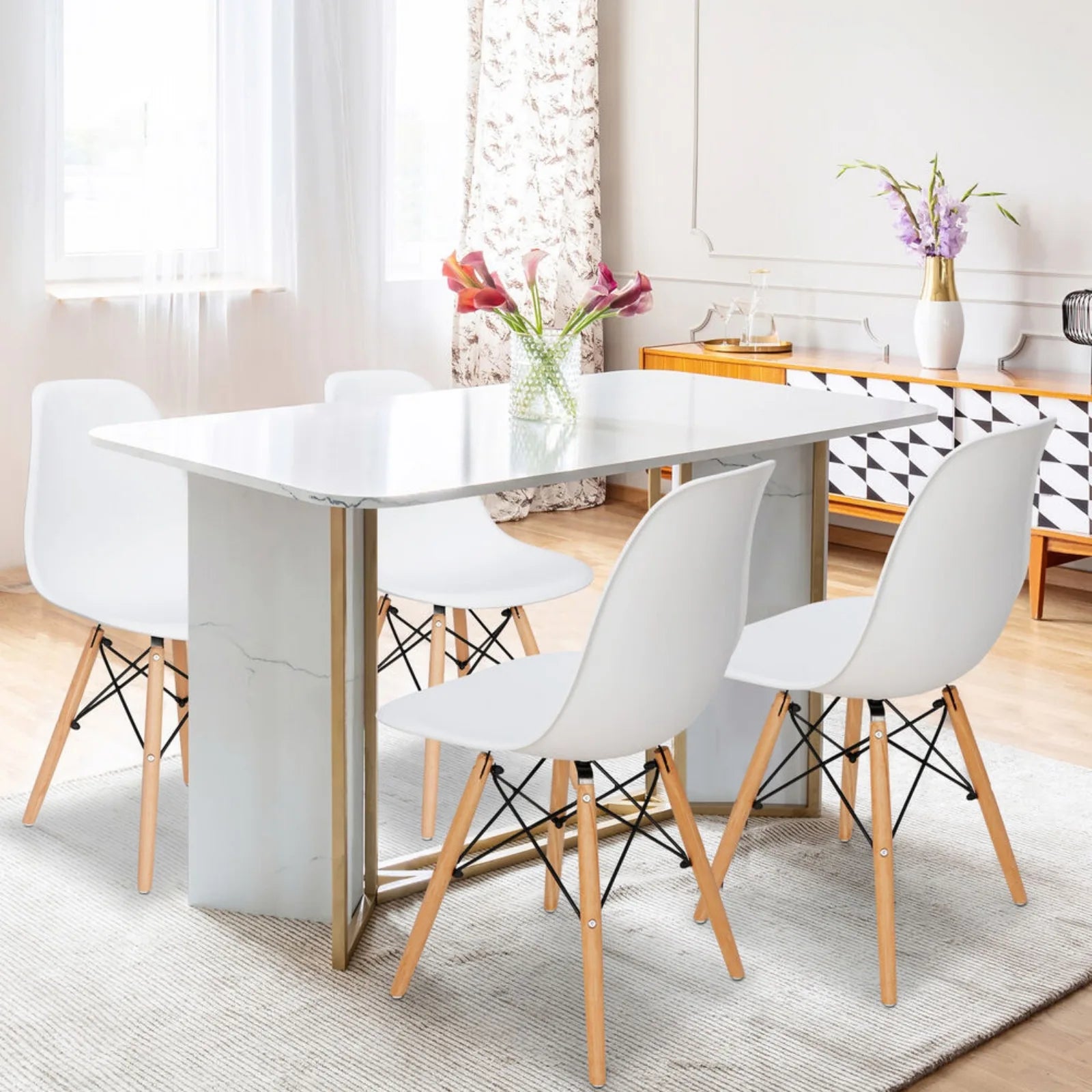 Set of four Lamp Post dining chairs with solid wood legs, featuring padded seats and a modern home sofa set design.