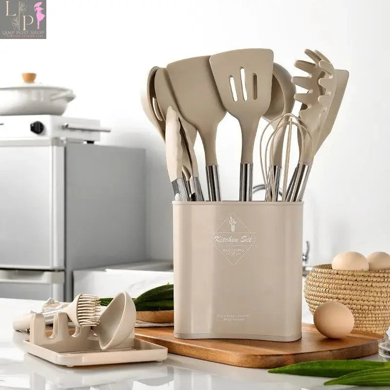 13-piece grey silicone kitchen utensil set with steel handles and storage bucket, ideal for cooking and kitchen organization.