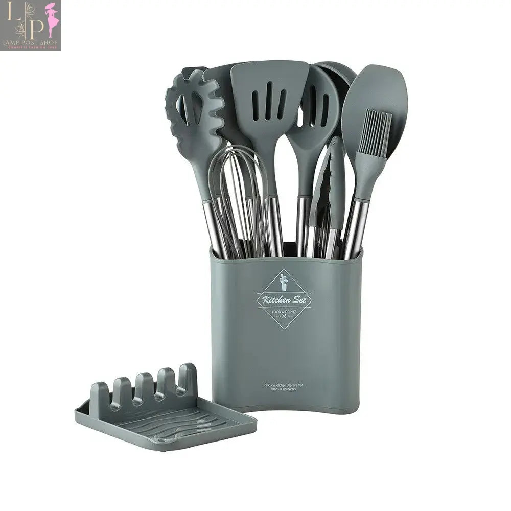 13-piece Lamp Post silicone kitchen utensil set with steel handles and storage bucket, including spoons, spatulas, and tongs.