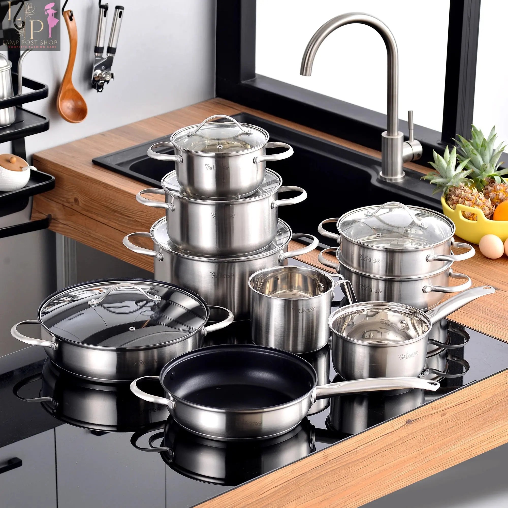 Lamp Post 14-piece Velaze stainless steel cookware set with induction-safe pots and pans for versatile kitchen use.