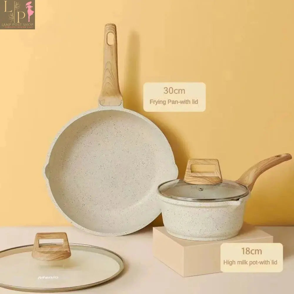 Lamp Post non-stick white granite cookware set with frying pans and saucepan, durable kitchen appliances for easy cooking.