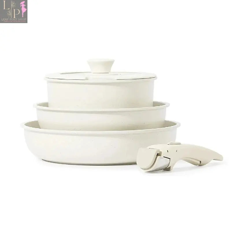 Lamp Post 5-piece non-stick cookware set with aluminum pots for home kitchen, including frying pans and saucepans on stove.