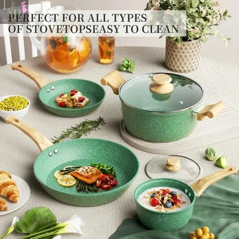 Lamp Post 8-piece nonstick cookware set with lids, includes frying pan, stockpot, and milk pot, in pink kitchen appliances.