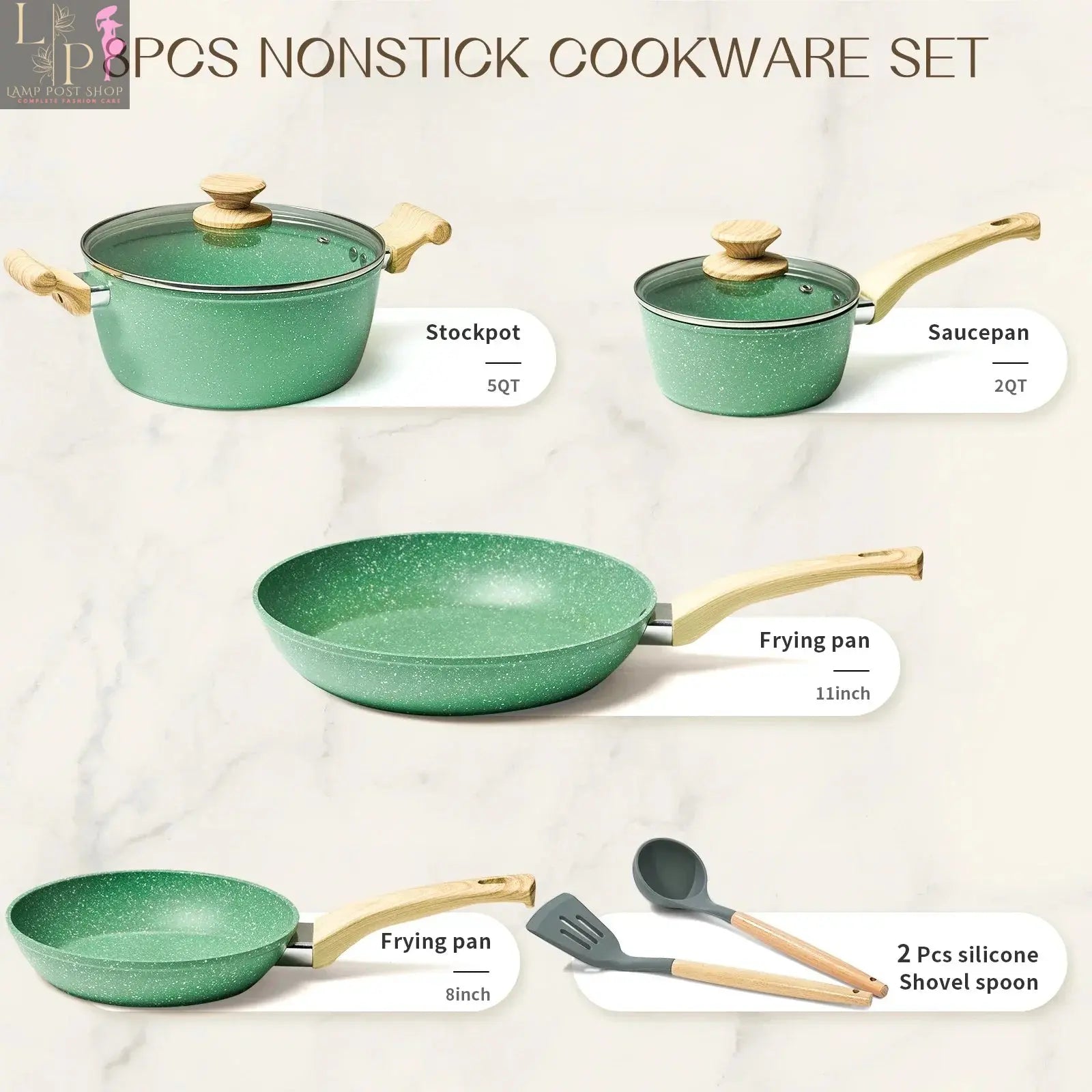Pink Lamp Post nonstick 8-piece cookware set with lids, including frying pan, stockpot, and milk pot, displayed in a kitchen setting.