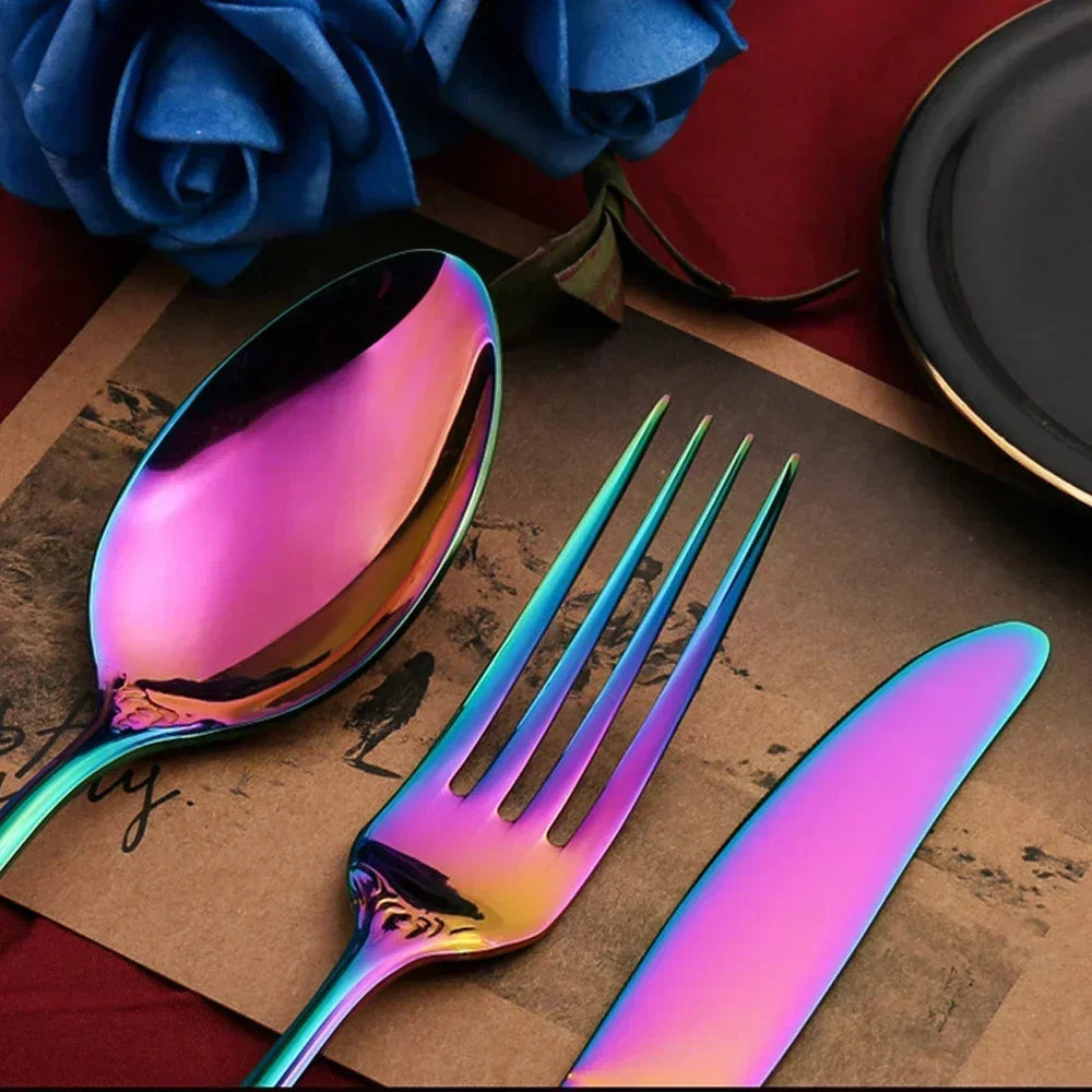 Golden stainless steel cutlery set by Lamp Post, complete 24-piece kitchen dishware including forks, knives, and spoons in a box.