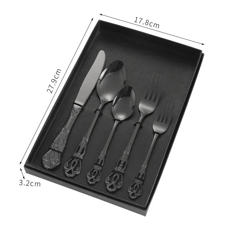 Golden stainless steel cutlery set by Lamp Post, complete 24-piece kitchen dishware with forks, knives, and spoons arranged in a box.