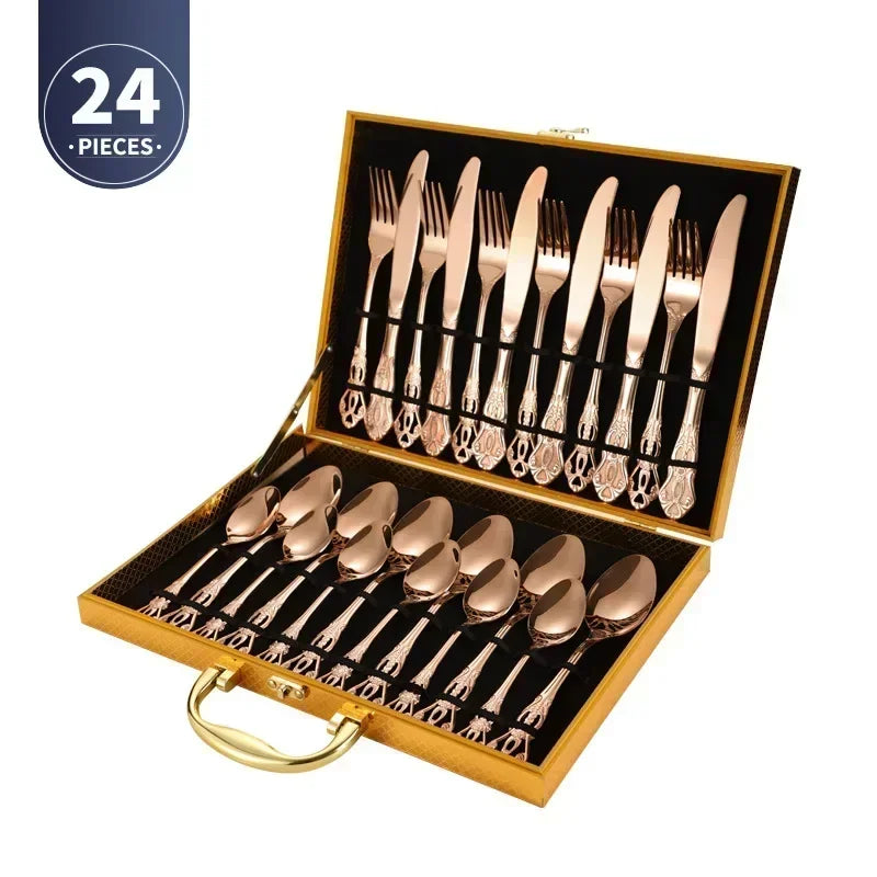 Golden stainless steel cutlery set by Lamp Post, complete 24-piece kitchen dishware including knives, forks, and spoons on a table.