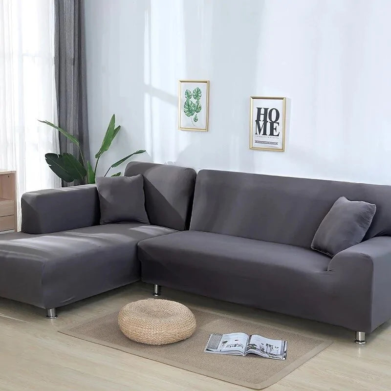 Lavender colorful sofa covers by Lamp Post on a sofa, showcasing vibrant, decorative fabric for home interior protection.