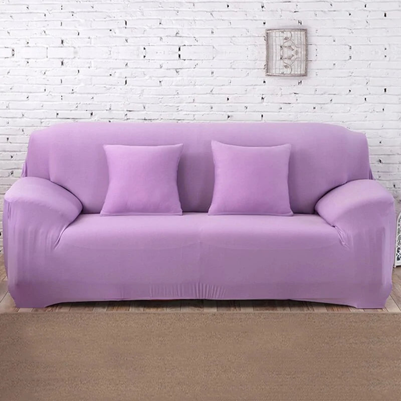 Lavender colorful sofa covers by Lamp Post featuring vibrant, decorative slipcovers to protect and refresh your sofa.