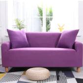Lavender colorful sofa covers by Lamp Post, featuring vibrant, decorative fabric draped over a sofa for a stylish look.