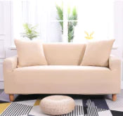 Lavender colorful sofa covers by Lamp Post shown on a sofa, featuring vibrant, decorative fabric for protection and style.