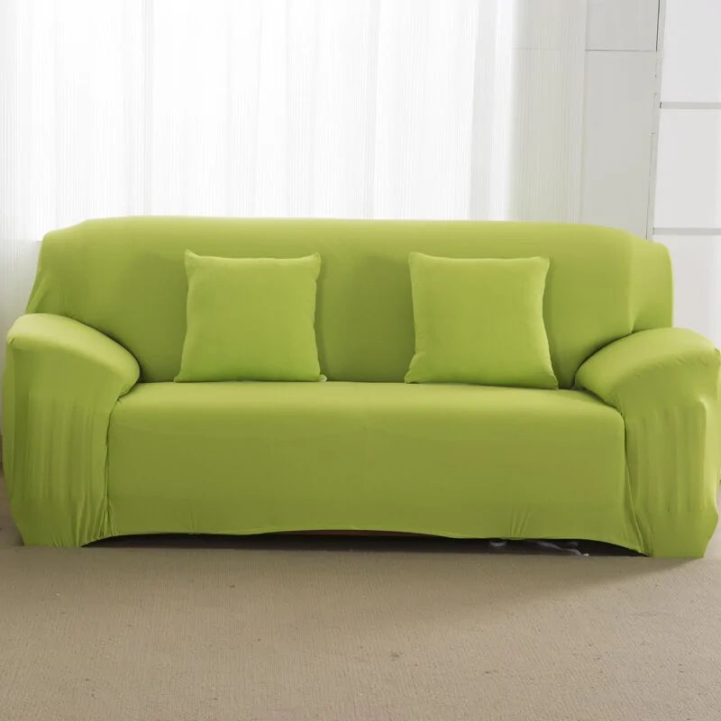 Lavender colorful sofa covers by Lamp Post draped over a sofa, showcasing vibrant, protective furniture covers in a lively design.