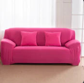 Lavender colorful sofa covers by Lamp Post, showcasing vibrant fabric designs on a cozy living room sofa.