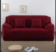 Lavender colorful sofa covers by Lamp Post draped over a sofa, showcasing vibrant and decorative fabric for home protection.
