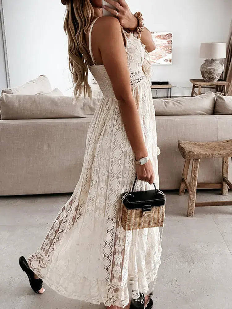 Beige women’s summer maxi dress by Lamp Post, flowing fabric, sleeveless design, styled for warm weather.