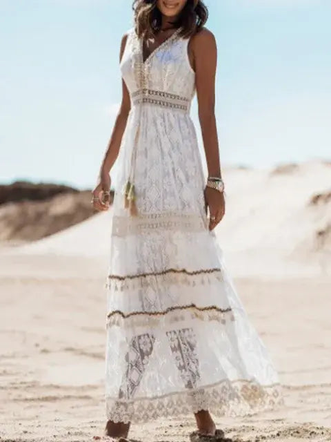 Beige women’s summer maxi dress by Lamp Post featuring a flowing fabric and sleeveless design, perfect for warm-weather wear.