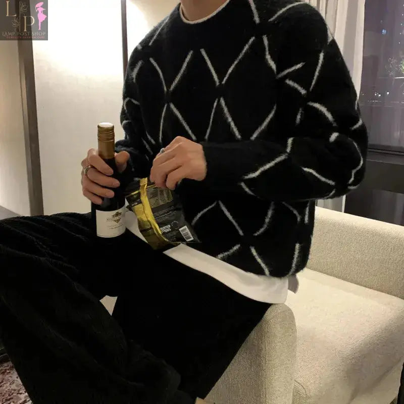 Stylish black men's sweater from Lamp Post, a versatile dress sweater for men, shown in a large size.