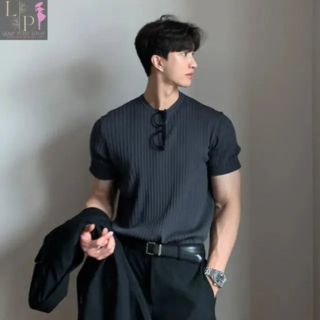 Black men's luxury knitted polo shirt by Lamp Post, stylish dress shirt for 2023, medium size, elegant men's clothing.