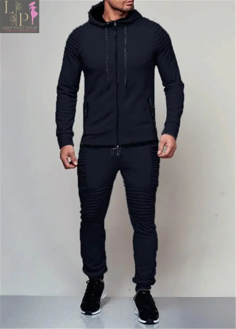 Black men's track suit by Lamp Post, made for men’s dress and athletic wear, featuring a full zip jacket and matching pants.