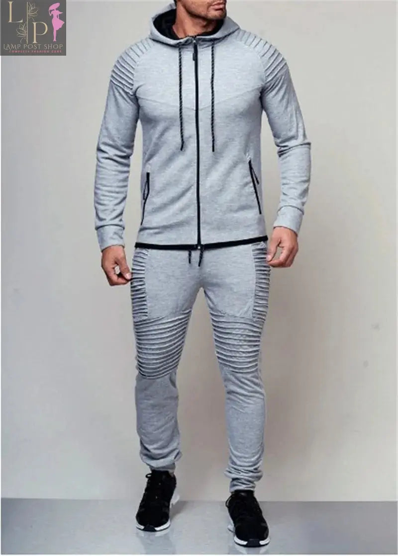Black men's track suit by Lamp Post, casual men's dress outfit, featuring a comfortable fit and sporty design for active wear.