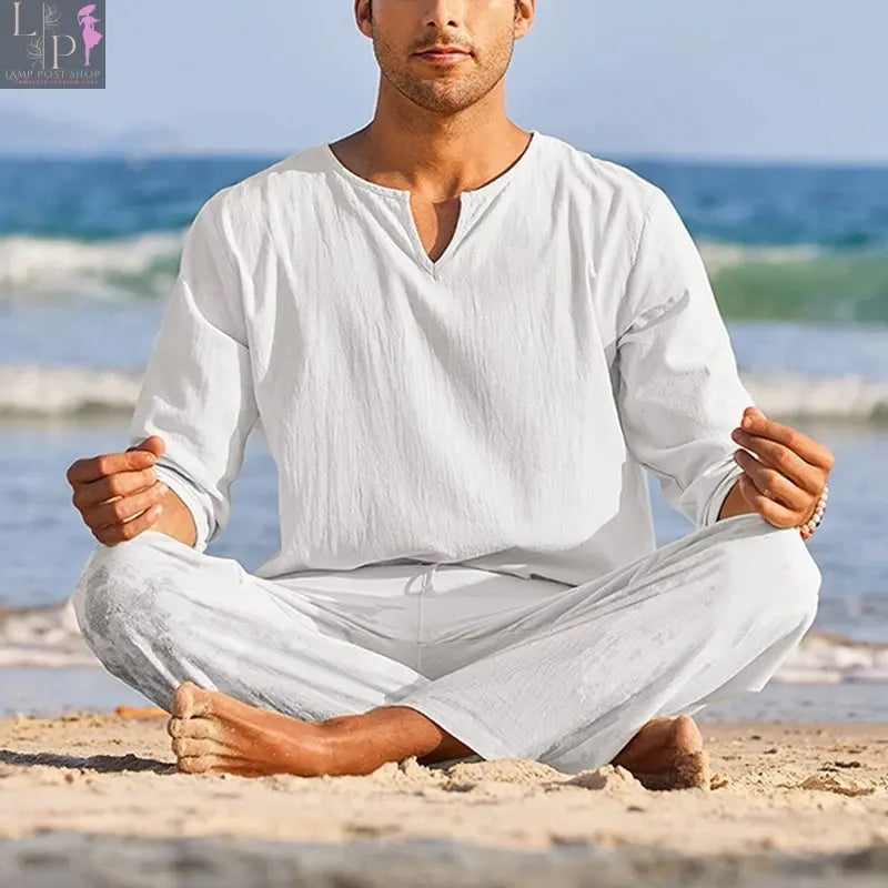 Men's navy blue summer cotton linen dress loungewear set with long sleeve Henley shirt and elastic waist drawstring pants.