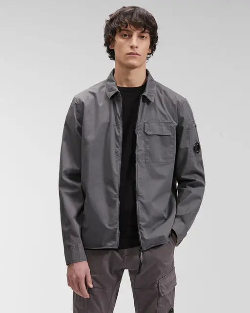 Black monochrome cotton men's jacket by Lamp Post, shown in medium size, with a stylish and casual design.