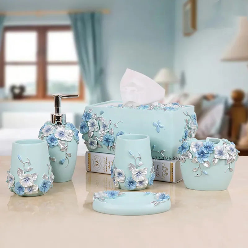 Modern Lamp Post bath accessories set with flower toothbrush holder, soap dispenser, tissue box, and tray for stylish bathroom decor.