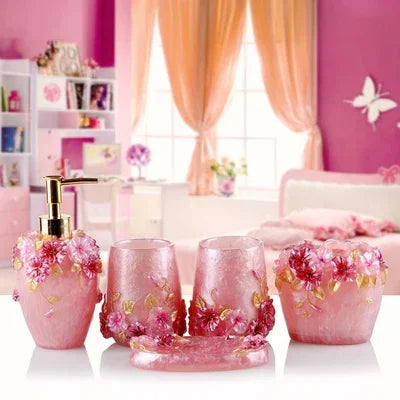 Modern Bath Accessories Set by Lamp Post with flower toothbrush holder, soap dispenser, tissue box, and tray for bathroom decor.