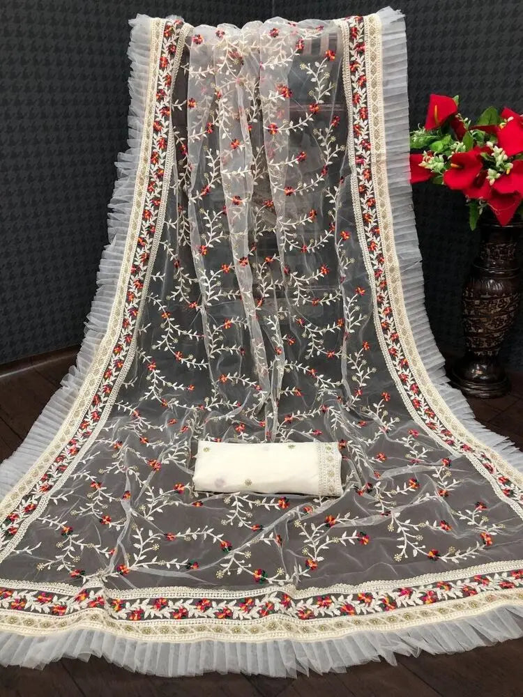 Traditional Indian saree by Lamp Post featuring intricate embroidery and printing in vibrant colors on lightweight fabric.
