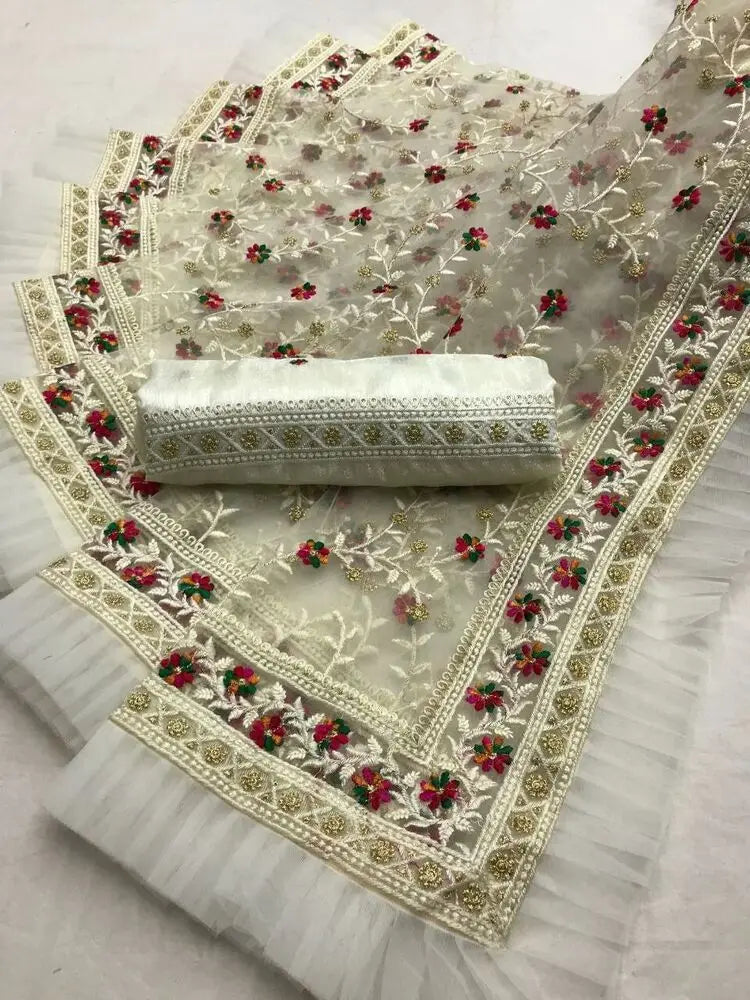 Indian saree with traditional embroidery and printing by Lamp Post, showcasing intricate design and vibrant fabric.