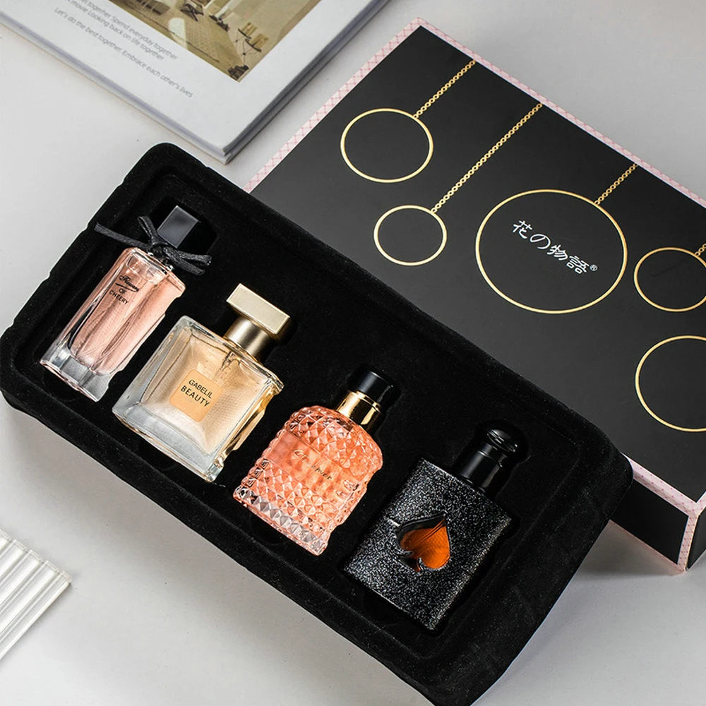 Set of four Lamp Post perfume for women with best smelling fragrances in elegant bottles on a neutral background.