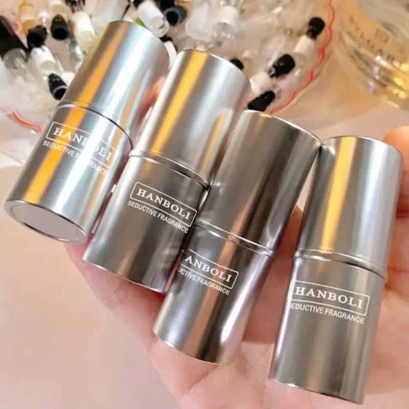 Lamp Post women's perfume roller ball with pheromone oil, 7g, featuring a sleek design for scent and attraction enhancement.