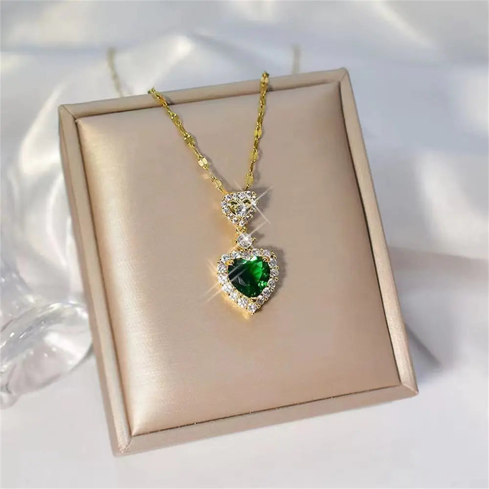 Women’s Crystal Jewelry Set with pink heart accents by Lamp Post, featuring matching necklace and earrings with sparkling crystals.