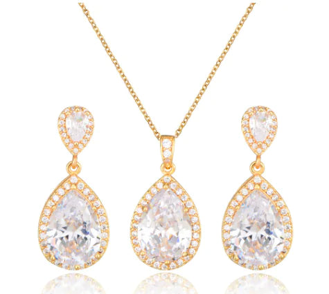 Red women jewelry set by Lamp Post featuring earrings and a matching necklace with elegant design.