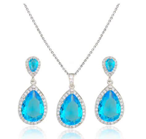 Red women's jewelry set by Lamp Post featuring matching necklace and earrings with elegant design.
